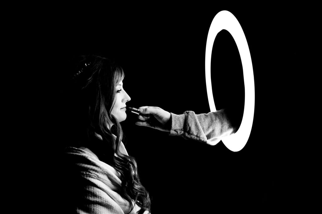 Detail wedding photos by Sascha Reinking Photography, Bride through the ring light, Jackie Reinking NYC officiant