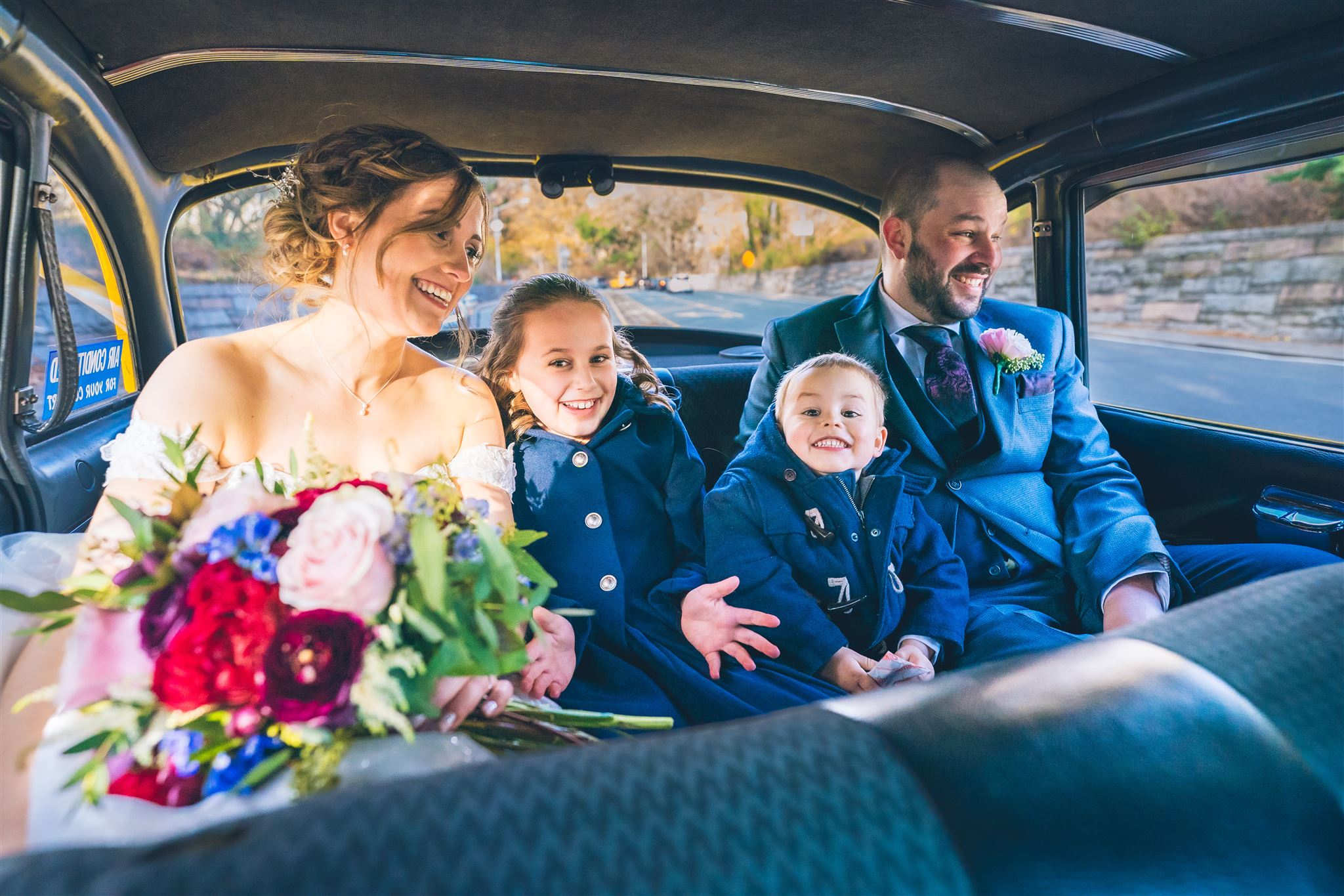 Celebrating family love at their Central Park ceremony at the Ladies Pavilion, officiated by Jackie Reinking, NYC wedding officiant