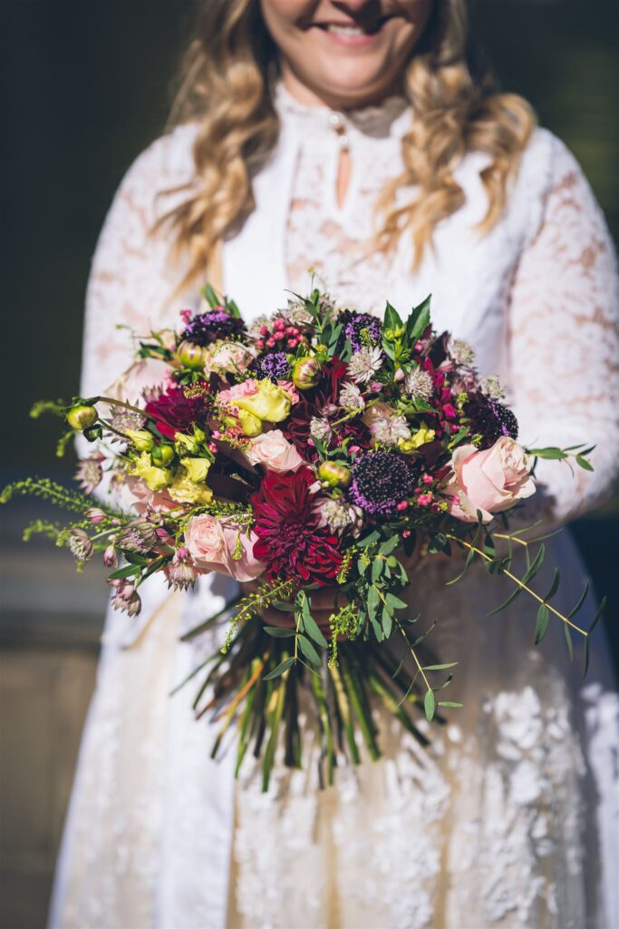 bride with bouquet and personal wedding details NYC elopement