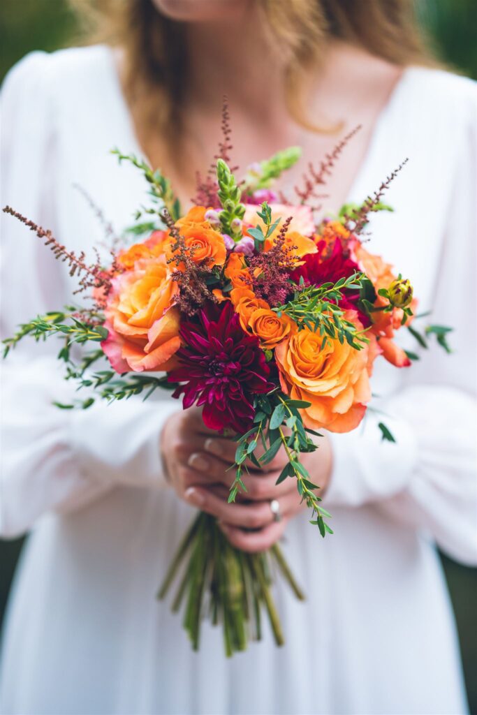 bride with bouquet and personal wedding details NYC elopement