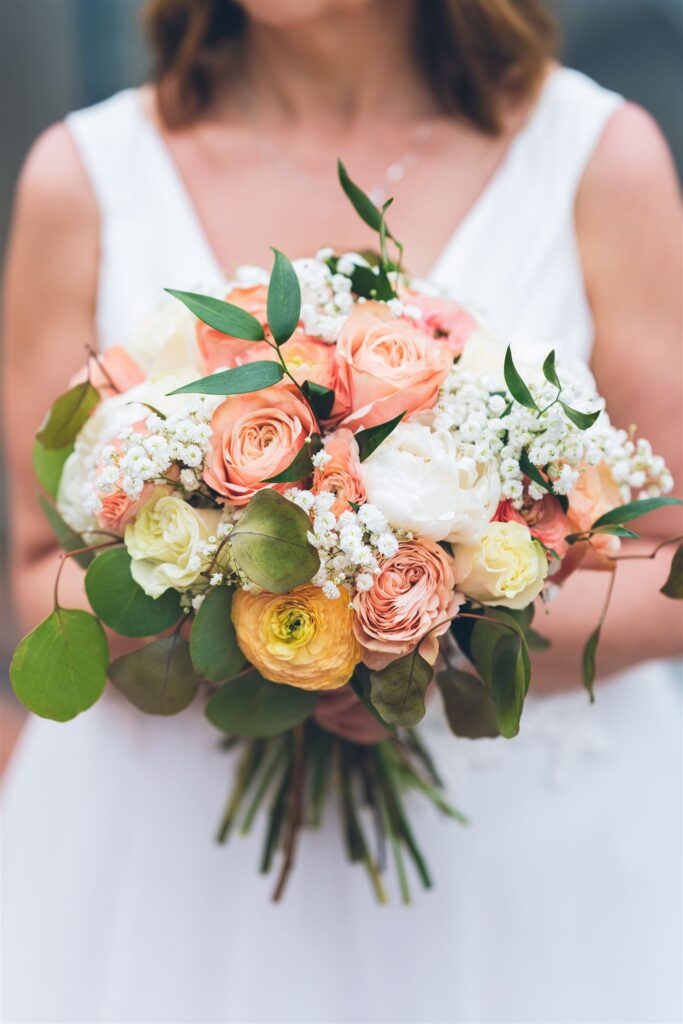 bride with bouquet and personal wedding details NYC elopement
